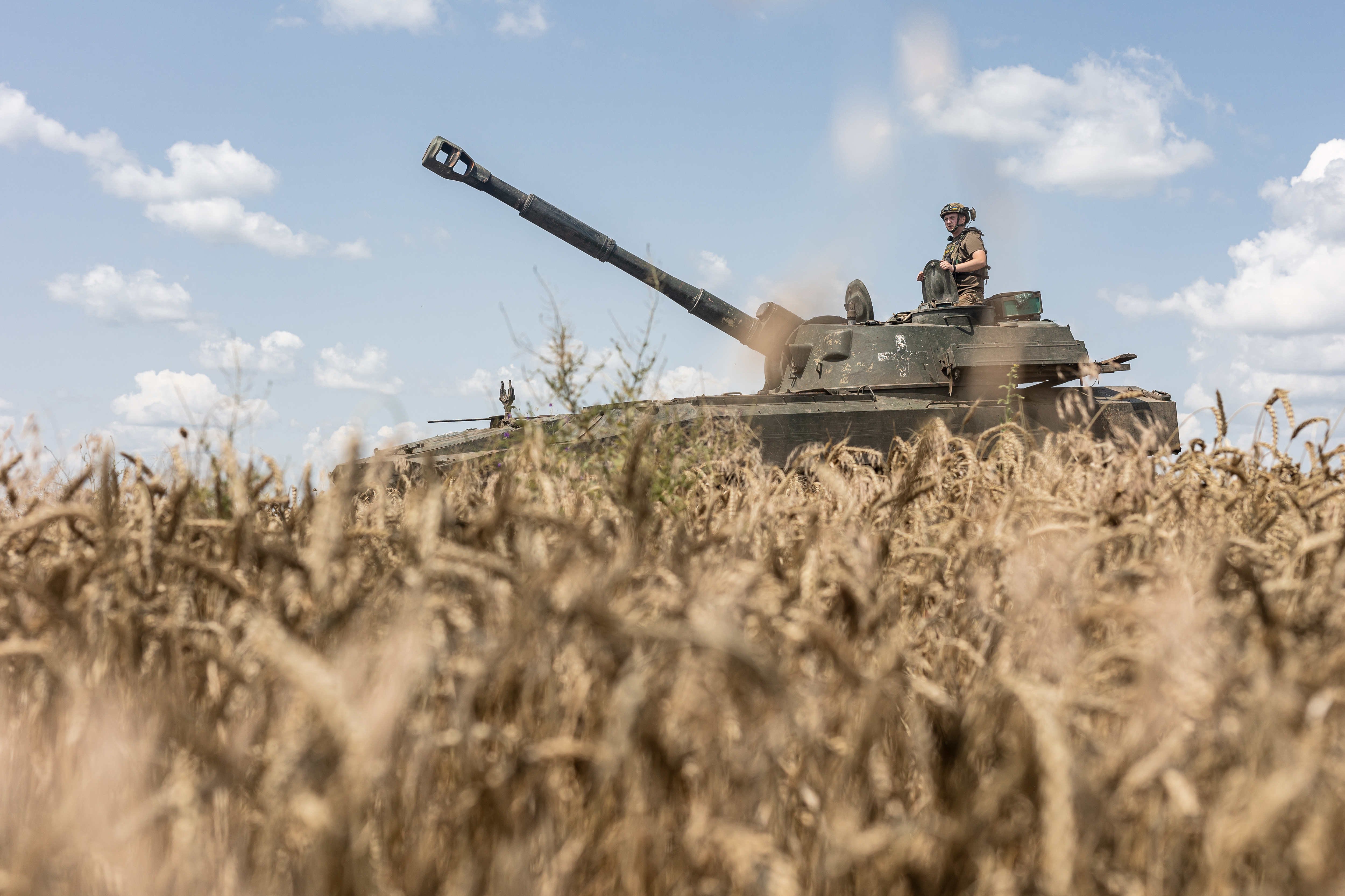 A Ukrainian soldier of the 72nd Brigade sits on a tank in the direction of Vuhledar village in Donetsk Oblast, Ukraine