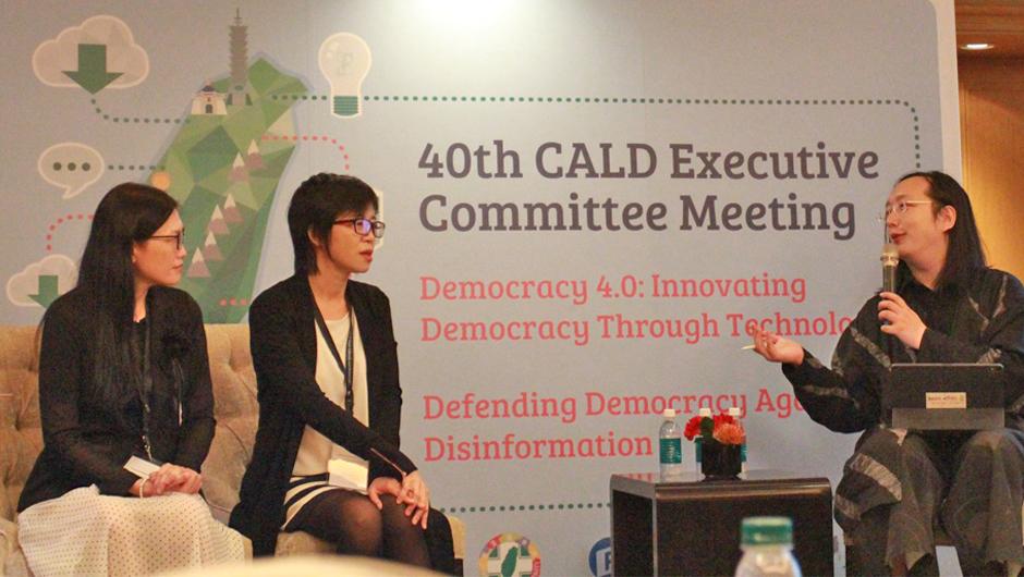 Audrey Tang (right) with one of the winning groups of the Presidential Hackathon