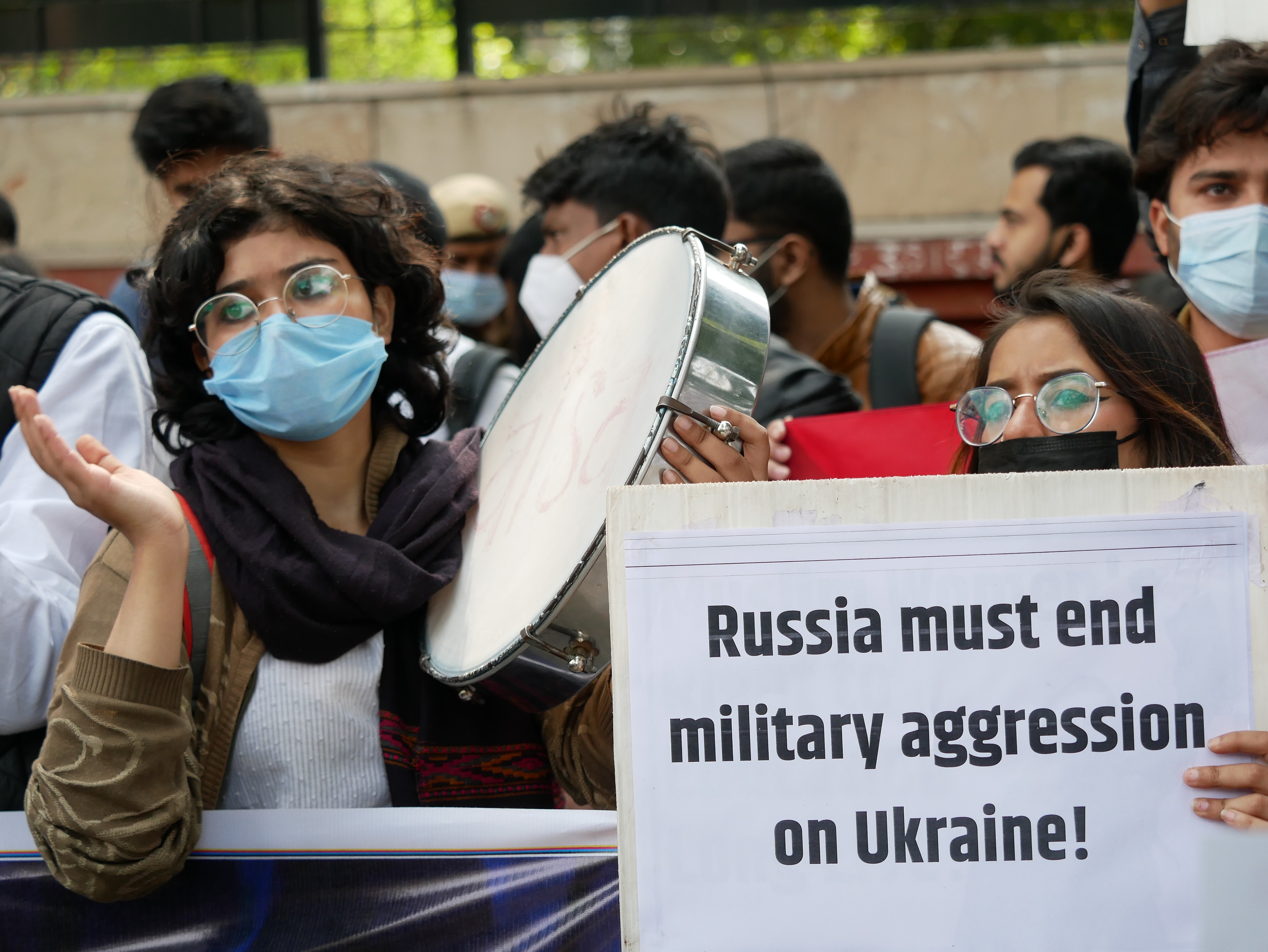 A protester with poster at Anti War protest march in New Delhi's Mandi House against the war in Ukraine