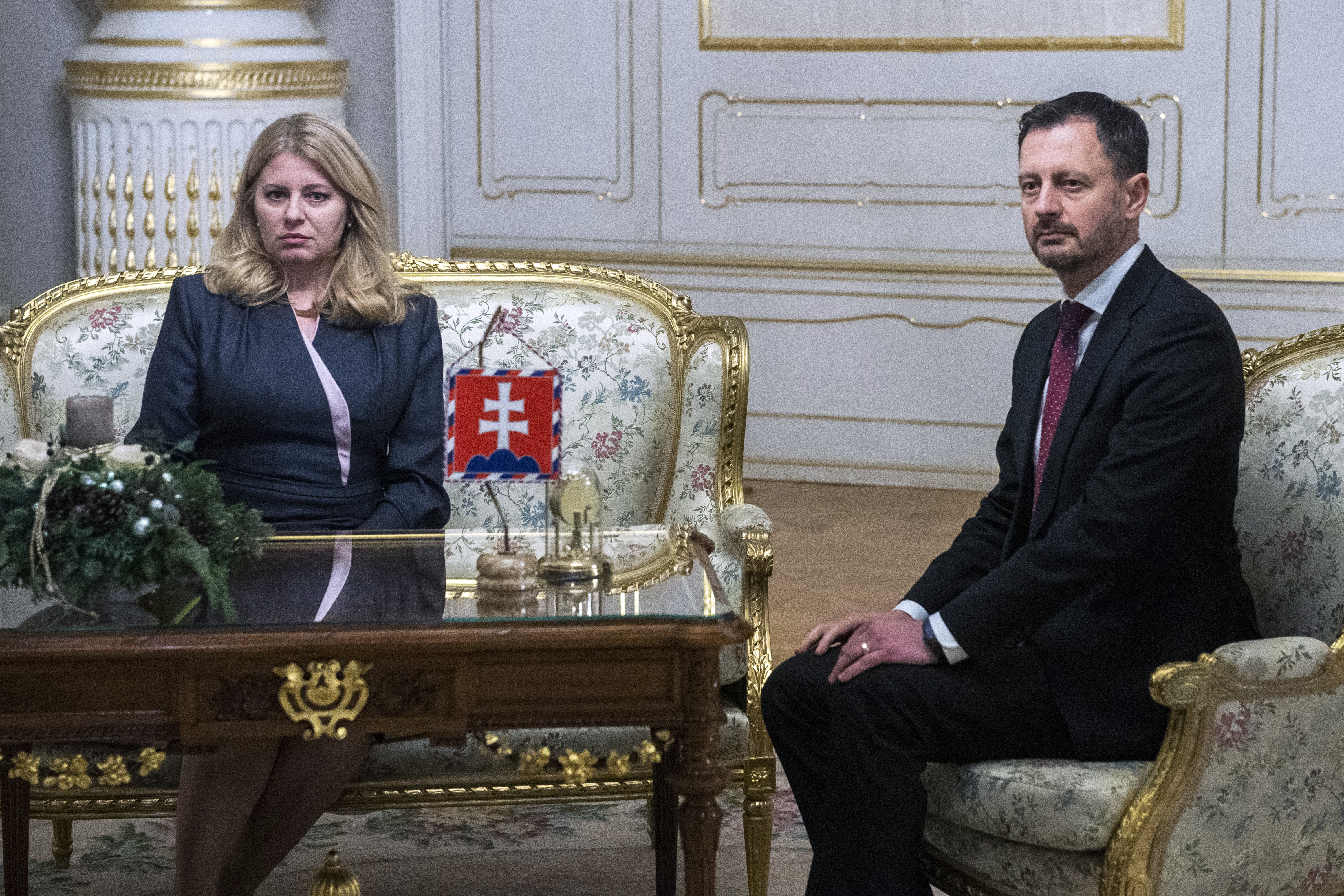Slovak Prime Minister Eduard Heger meets Slovak President Zuzana Caputova after parliament passed a vote of no confidence in his government at the Presidential Palace in Bratislava