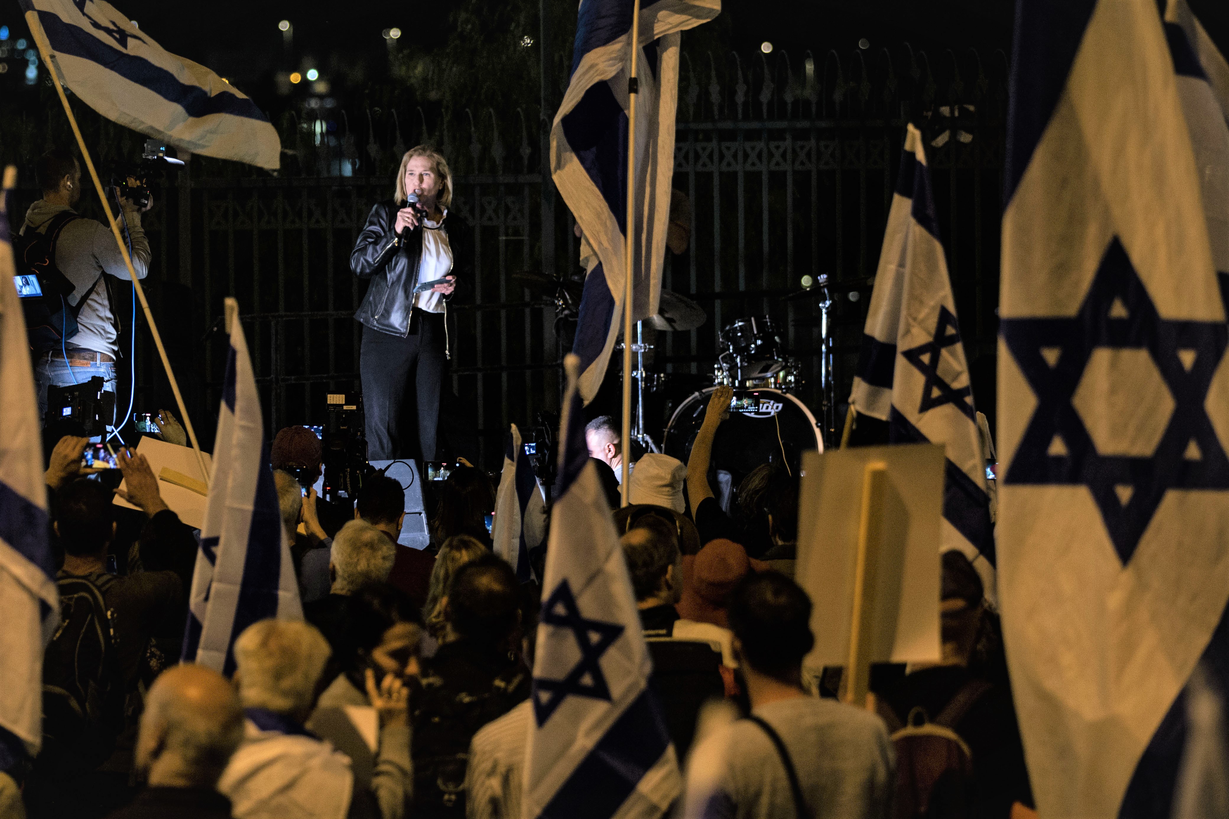 Former Israeli Foreign Minister Tzipi Livni speaks during a protest against the Prime Minister Benjamin Netanyahu's judiciary overhaul in front of the Israeli prime ministry office in Jerusalem