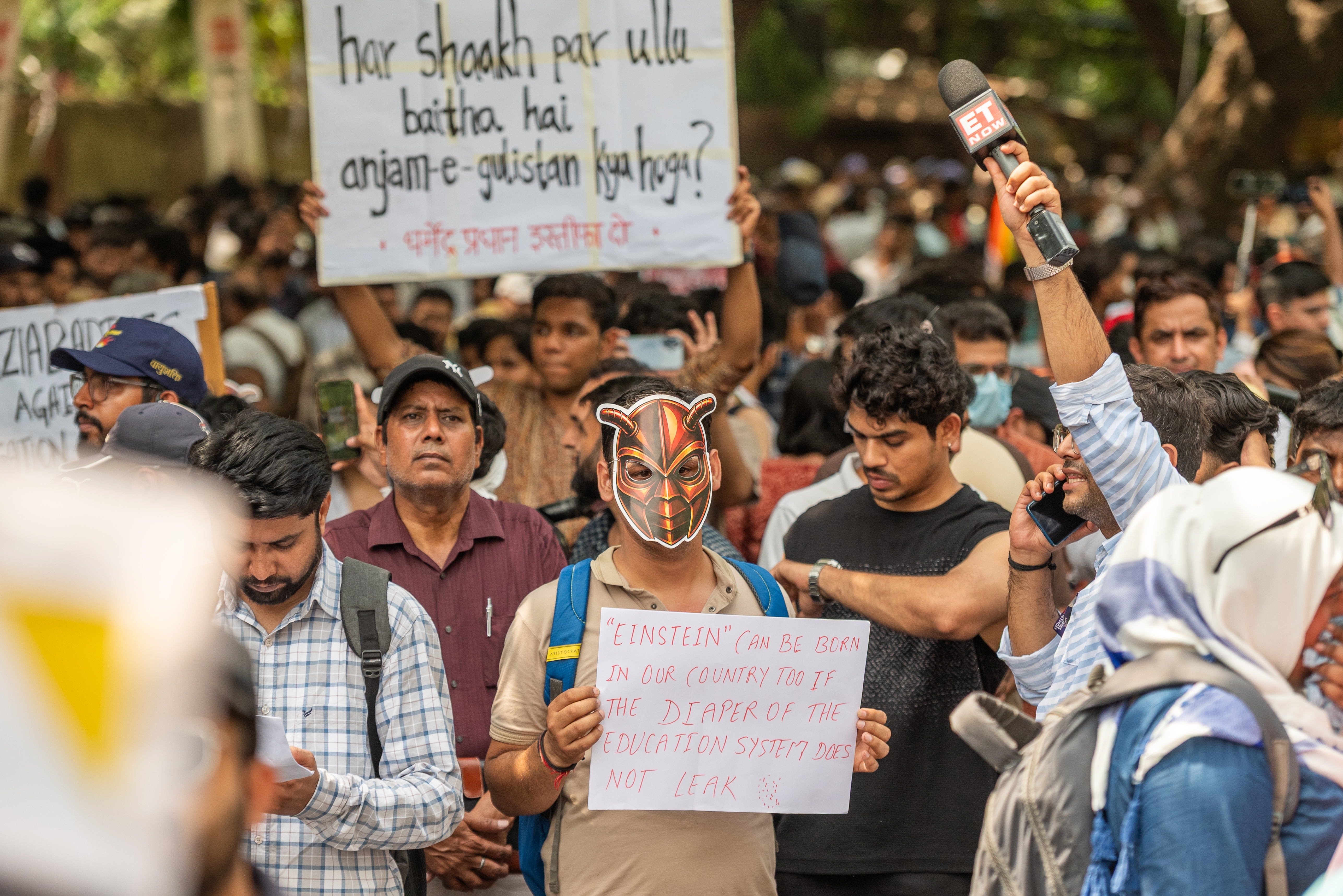 Cockroach Janta Party supporters protest over exam paper leaks in New Delhi.