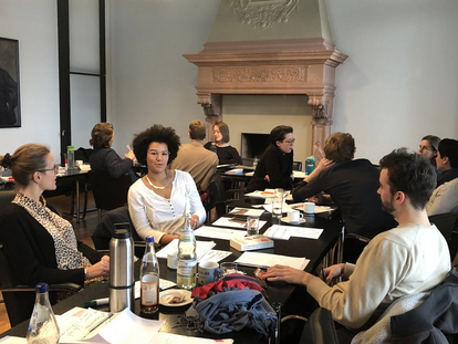 Students at a meeting
