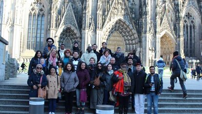Group Photo of participants in front of the Cologne Cathedral