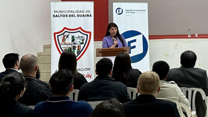 Nadia Barrozo, Project Coordinator of FNF Argentina, gives the opening remarks at the conference.