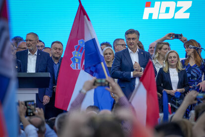 Prime Minister Andrej Plenković, centre right, takes part in a rally of his party in Zagreb, Croatia