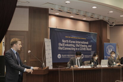 Tim Brose, the Program Officer at FNF Korea, is introducing the penal and the speaker at this conference