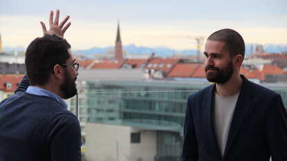 Diskussionen über den Dächern Münchens