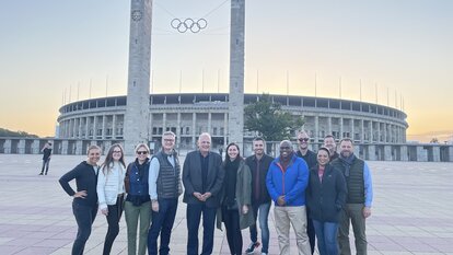 The group in front of the Olympic Stadium in Berlin
