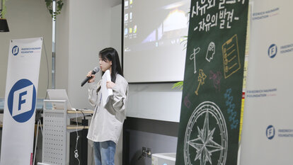 Participant presenting her essay