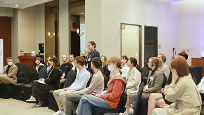 student raising a question