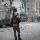 Principal avenue in Valparaiso, just few meters from Chilean National Congress, place where people carrying stones in their hands, faced police special group, trying to gets Congress front gate.