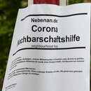 Ein Aushang zur Nachbarschaftshilfe in Freiburg.