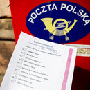 A copy of the 'election package' documents is photographed for illustration photo with Poczta Polska mailbox in the background. Krakow, Poland on May 2nd, 2020. A voting package leaked in the upcoming correspondence election with a full list of candidates for Presidential office and with name and surname statement on secret voting. Despite coronavirus pandemic, Poland's government plans to hold the presidential election on May 10 in the form of a correspondence vote.