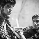 He was a tough-looking youth of twenty-five or six