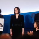 Tatsiana Khomich, sister of arrested Belarussian opposition politician Maria Kalesnikava, Belarusian opposition leader Svetlana Tikhanovskaya and Belarusian political activist Veronika Tsepkalo attend the Charlemagne Prize (Karlspreis) ceremony in the town hall of Aachen, Germany