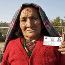 80-year-old Ratna Maya Thapa from the Central Region of Nepal shows her voter registration card after walking for one and a half hours to cast her ballot in the Nepalese Constituent Assembly elections. 10/Apr/2008. Dolakha, Nepal. UN Photo/Nayan Tara. 