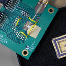 A semiconductor sits between a conductor and an insulator and is commonly used in the development of electronic chips, computing components, and devices. 