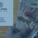 Man counting PKR 5000 notes with the overlay the budget document screenshot