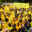 People Rallying on Road