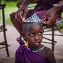 maasai-girl-tries-on-crown-in-tanzania-shutterstock.jpg