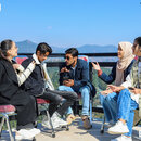 Individualland Hybrid course finalist engaged in discussion 