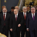 From left, Armenian Prime Minister Nikol Pashinyan, Russian President Vladimir Putin, Kazakhstan's President Kassym-Jomart Tokayev and Tajikistan's President Emomali Rahmon enter a hall prior to a meeting of the leaders of the Collective Security Treaty Organization (CSTO) at the Kremlin in Moscow, Russia, Monday, May 16, 2022.