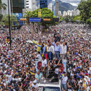 Opposition leader María Corina Machado and opposition candidate Edmundo González Urrutia ride on a truck during a demonstration against the official results of the presidential election declaring President Nicolas Maduro the winner in Caracas, Venezuela,