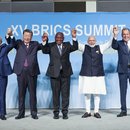 Left to right: Brazilian President Luiz Inacio Lula da Silva, Chinese President Xi Jinping, South African President Cyril Ramaphosa, Indian Prime Minister Narendra Modi and Russian Foreign Minister Sergey Lavrov pose for the group photo at the 15th BRICS Summit, August 23, 2023 in Johannesburg, South Africa.