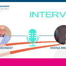 A cover photo featuring Mirna Mneimneh, member of Future Movement and president of AHLN, alongside Mr. Jörg Dehnert, Regional Director of FNF-MENA, during their interview. The image captures a professional setting, highlighting their discussion on the election of Lebanon's new Prime Minister and its implications for the MENA region