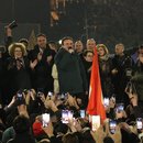 Kosovo's Prime Minister Albin Kurti celebrates with his supporters in front of the government building in Pristina, Kosovo 