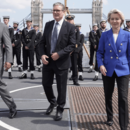European Council President Antonio Costa, from left, Britain's Prime Minister Keir Starmer and President of the European Commission Ursula von der Leyen with members of the Royal Navy on board Type 23 frigate HMS Sutherland in central London, following the UK-EU Summit,