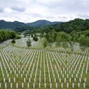 Gravestones are lined up at the memorial cemetery in Potocari, near Srebrenica, Bosnia