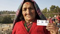 80-year-old Ratna Maya Thapa from the Central Region of Nepal shows her voter registration card after walking for one and a half hours to cast her ballot in the Nepalese Constituent Assembly elections. 10/Apr/2008. Dolakha, Nepal. UN Photo/Nayan Tara. 