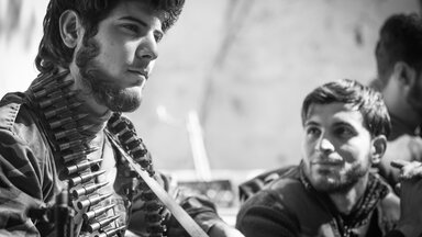 He was a tough-looking youth of twenty-five or six