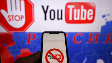 Logo of the YouTube video sharing platform on a smartphone