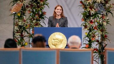 The daughter of the Nobel Peace Prize laureate, Ana Corina Sosa, accepts the award on behalf of her mother, Venezuelan opposition leader Maria Corina Machado, during the Nobel Peace Prize ceremony
