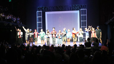 Cast members of 'A Game of Trolls' bow to the crowd