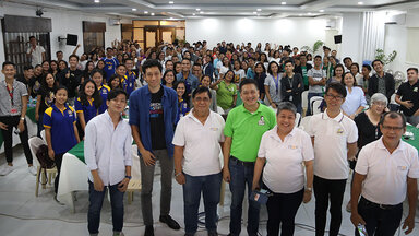 Group photo of the 'I am Free to Lead' panel and audience